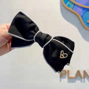 BOW HAIRPIN IN BLACK AND WHITE TRIM COTTON 406022