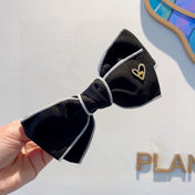 BOW HAIRPIN IN BLACK AND WHITE TRIM COTTON 406022