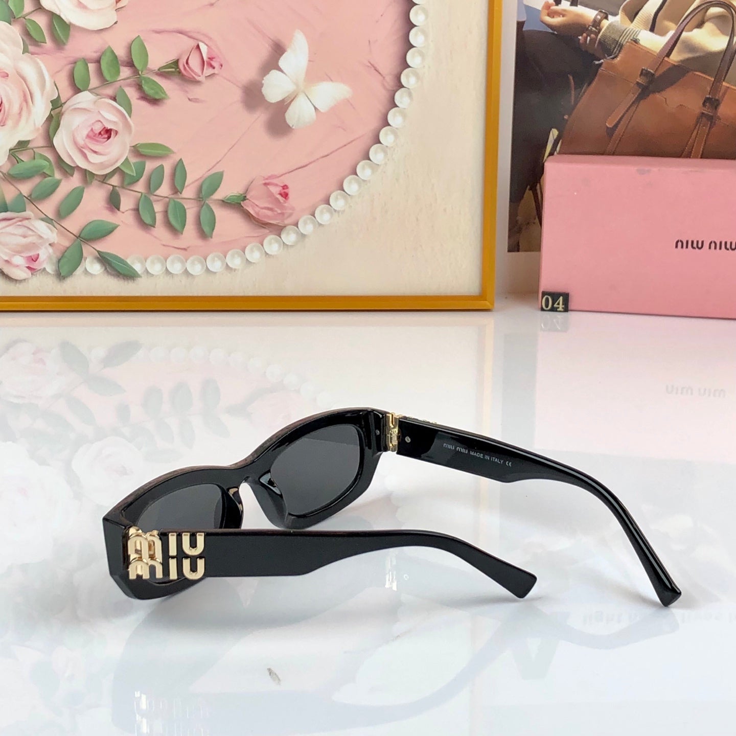 MIUMIU 26S RECTANGULAR FRAME IN ACETATE 445497
