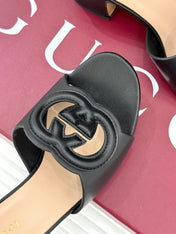 MID-HEEL MULE IN BLACK CALFSKIN