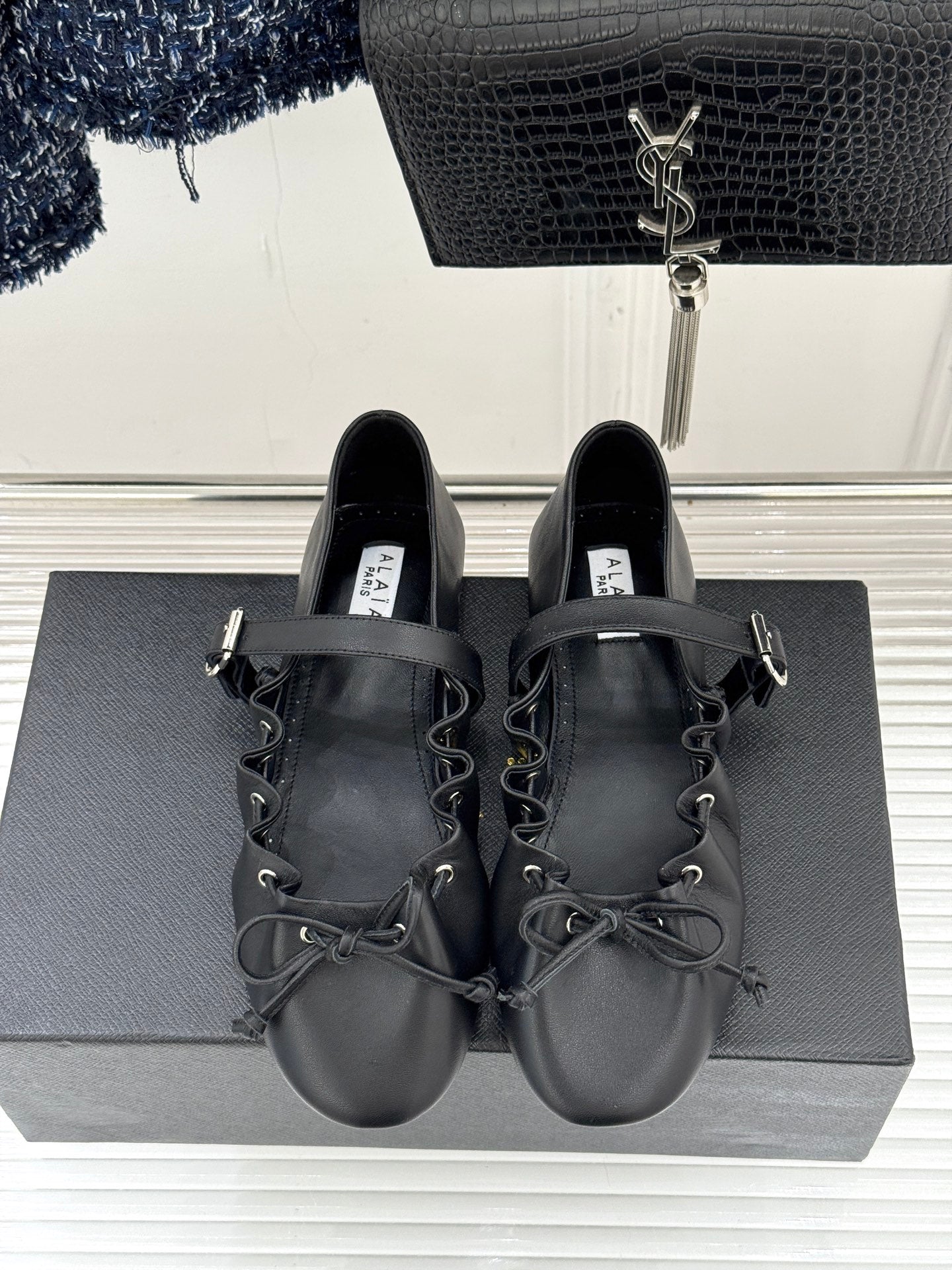 ALAIA 26S MARY JANE FLATS IN BLACK LAMBSKIN WITH BOW