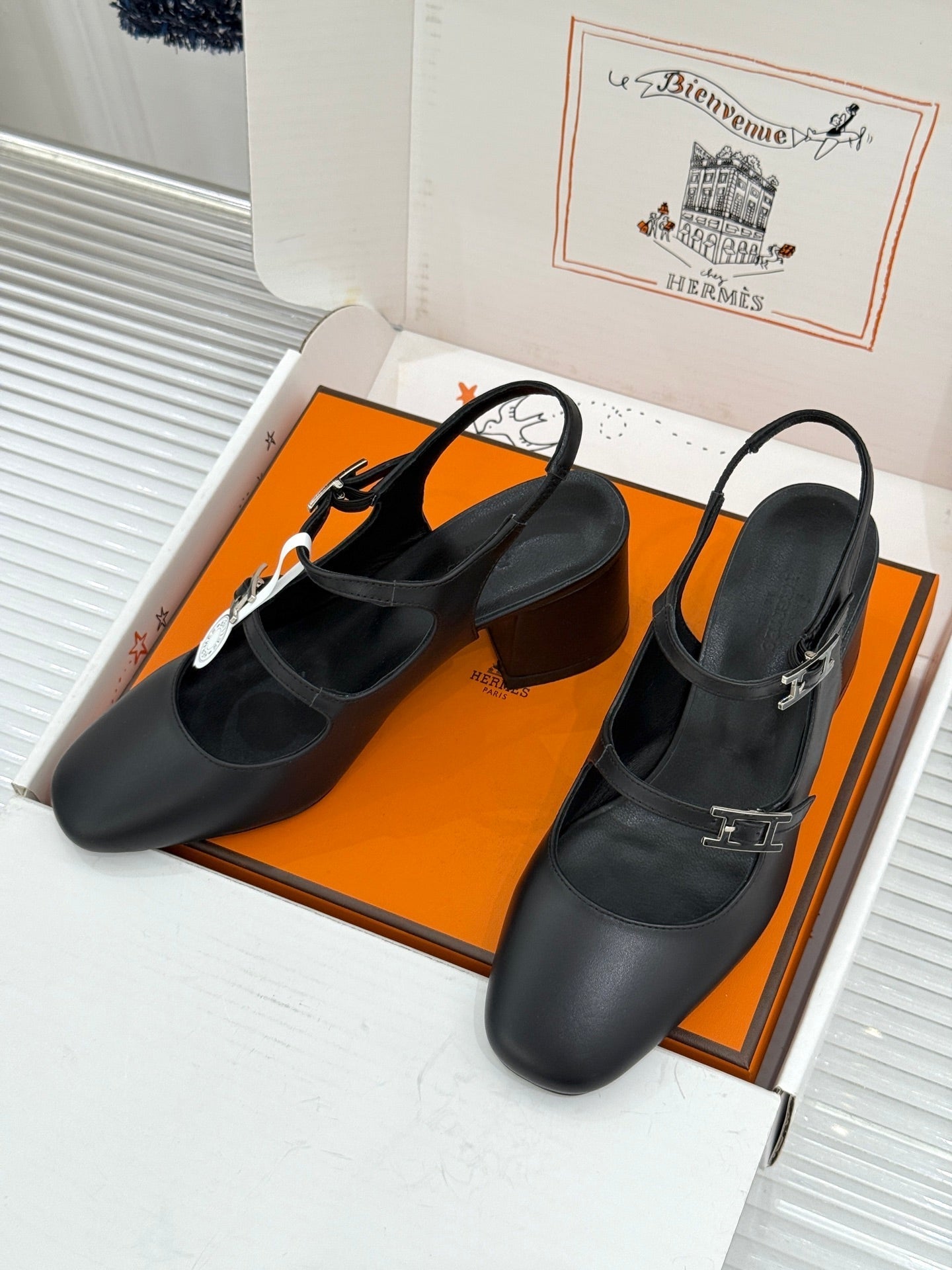 HM 26S SLINGBACK HIGH HEELS IN BLACK CALFSKIN