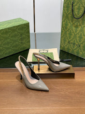 GG HIGH SLINGBACK 10.5 CM IN DOVE GREY GLOSSY CALFSKIN WITH GOLD HARDWARE