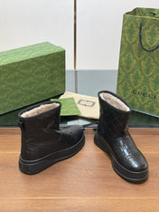 GG UGG BOOTS IN BLACK EMBOSSED DEERSKIN AND BEIGE WOOL LINING