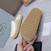 PRADA 26S MULES ESPADRILLES IN WHITE CALFSKIN