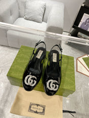 METALIC SLINGBACK FLATS IN BLACK CALFSKIN