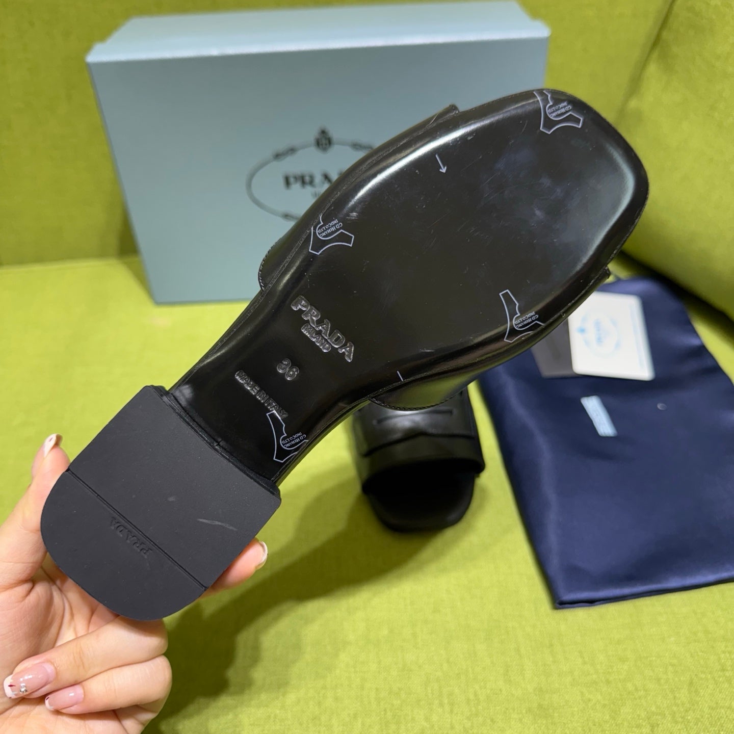PRADA 25S SLIDES IN BLACK CALFSKIN