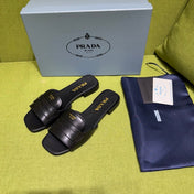 PRADA 25S SLIDES IN BLACK CALFSKIN