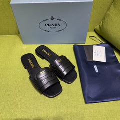 PRADA 25S SLIDES IN BLACK CALFSKIN
