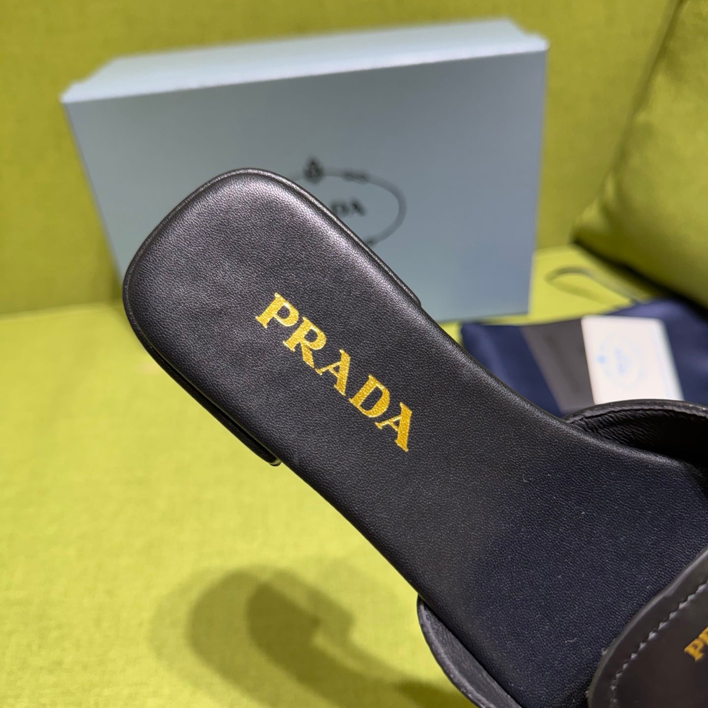 PRADA 25S SLIDES IN BLACK CALFSKIN