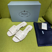 PRADA 25S SLIDES IN WHITE CALFSKIN