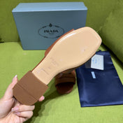 PRADA 25S SLIDES IN BROWN CALFSKIN