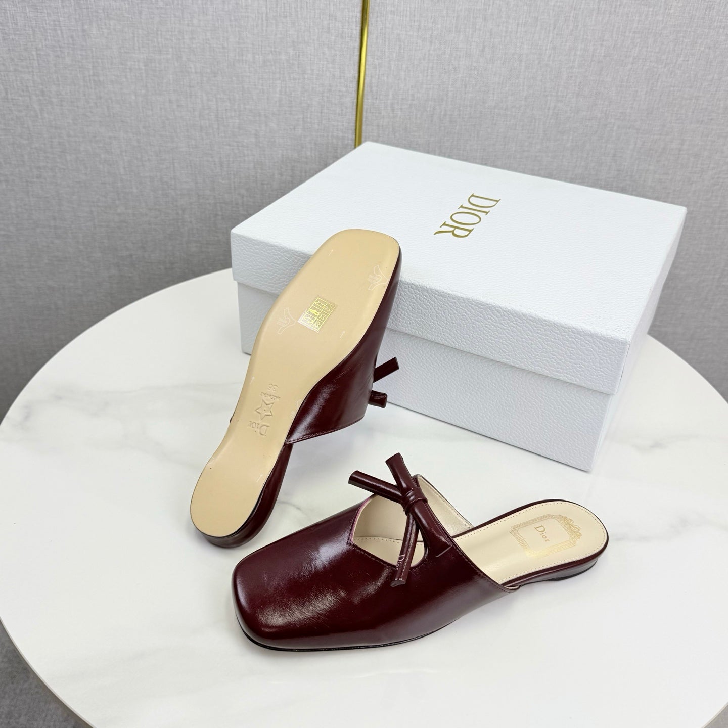 DIOR 26S PEARL-ACCENT BOW FLAT MULES IN DARK RED GLOSSY CALFSKIN