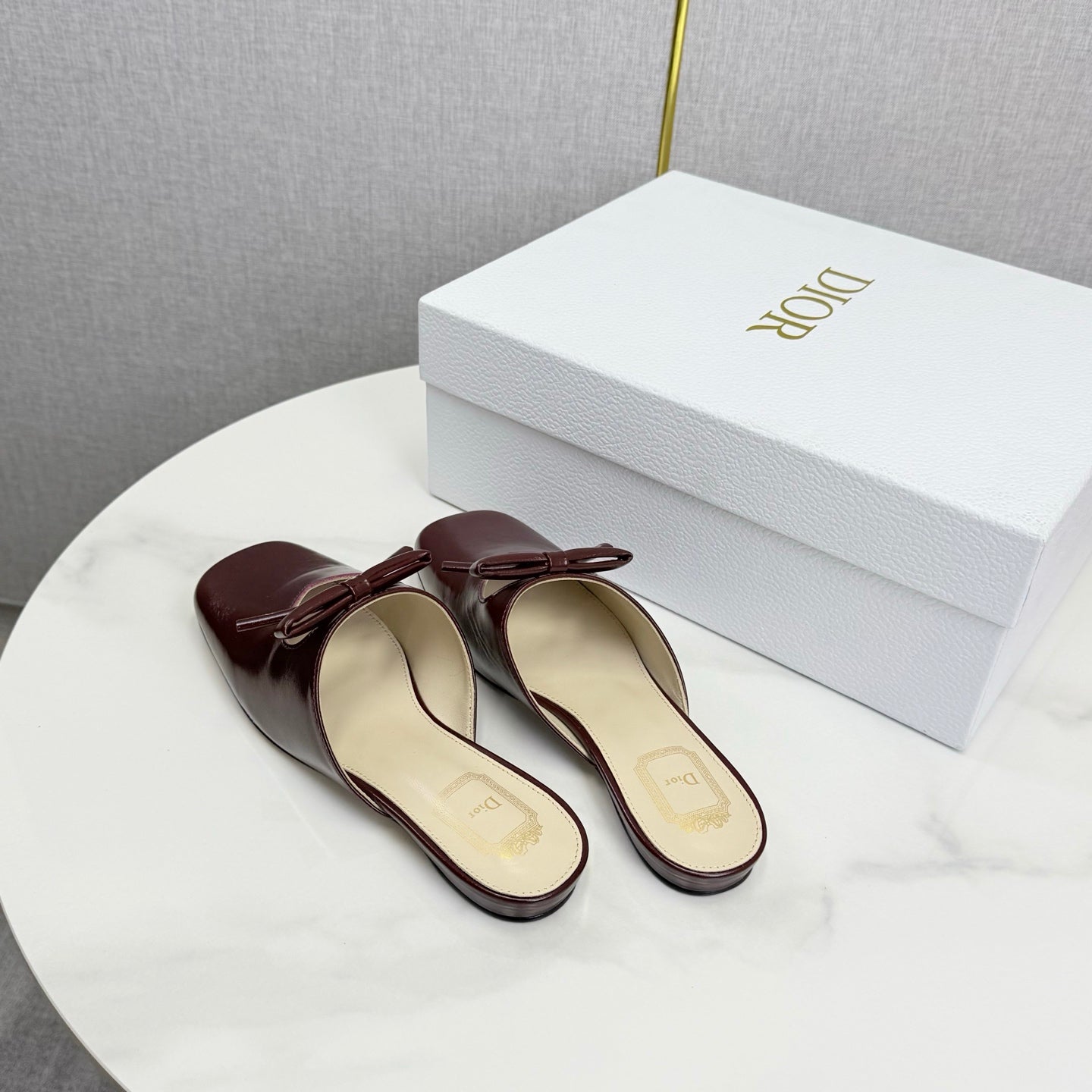 DIOR 26S PEARL-ACCENT BOW FLAT MULES IN DARK RED GLOSSY CALFSKIN