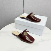 DIOR 26S PEARL-ACCENT BOW FLAT MULES IN DARK RED GLOSSY CALFSKIN