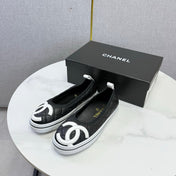 CHANEL 26S CC LOGO SLIP-ON SNEAKERS IN BLACK CALFSKIN
