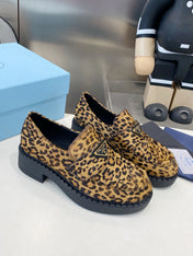 PRADA 26S LOAFERS IN BROWN LEOPARD PRINT PONY HAIR