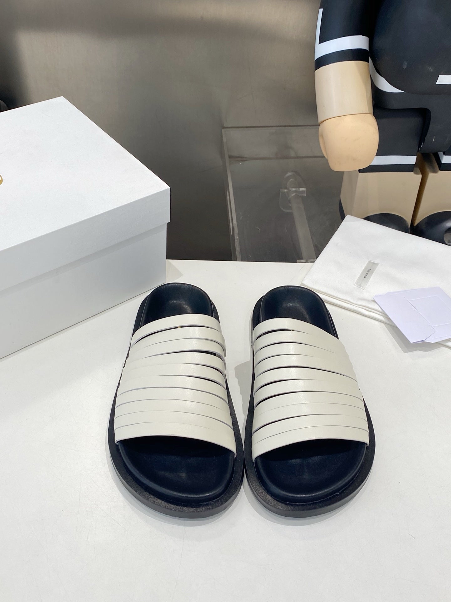 THE ROW 26S MULTI STRAP SLIDES IN WHITE CALFSKIN