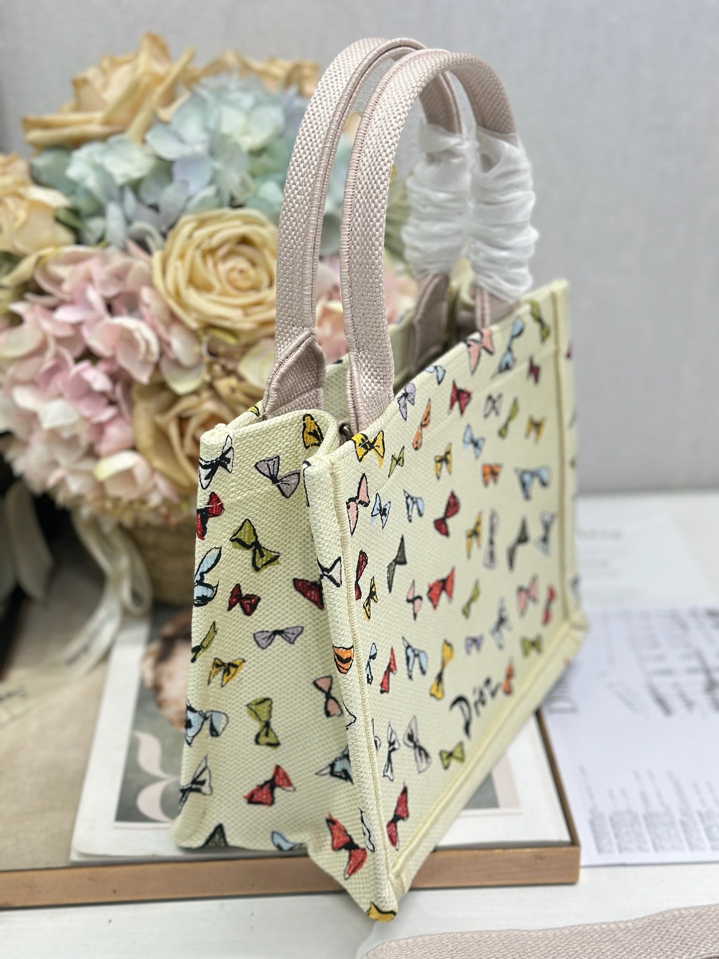 DIOR 26S MINI BOOK TOTE 26 IN BEIGE WHITE BOW PRINT WOVEN FABRIC