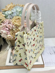 DIOR 26S MINI BOOK TOTE 26 IN BEIGE WHITE BOW PRINT WOVEN FABRIC