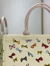 DIOR 26S LARGE BOOK TOTE 42 BEIGE WHITE BOW PRINT WOVEN FABRIC