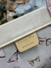 DIOR 26S LARGE BOOK TOTE 42 BEIGE WHITE BOW PRINT WOVEN FABRIC