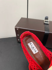 ALAIA BALLET FLATS IN CHERRY RED MESH FISHNET WITH GOLD HARDWARE