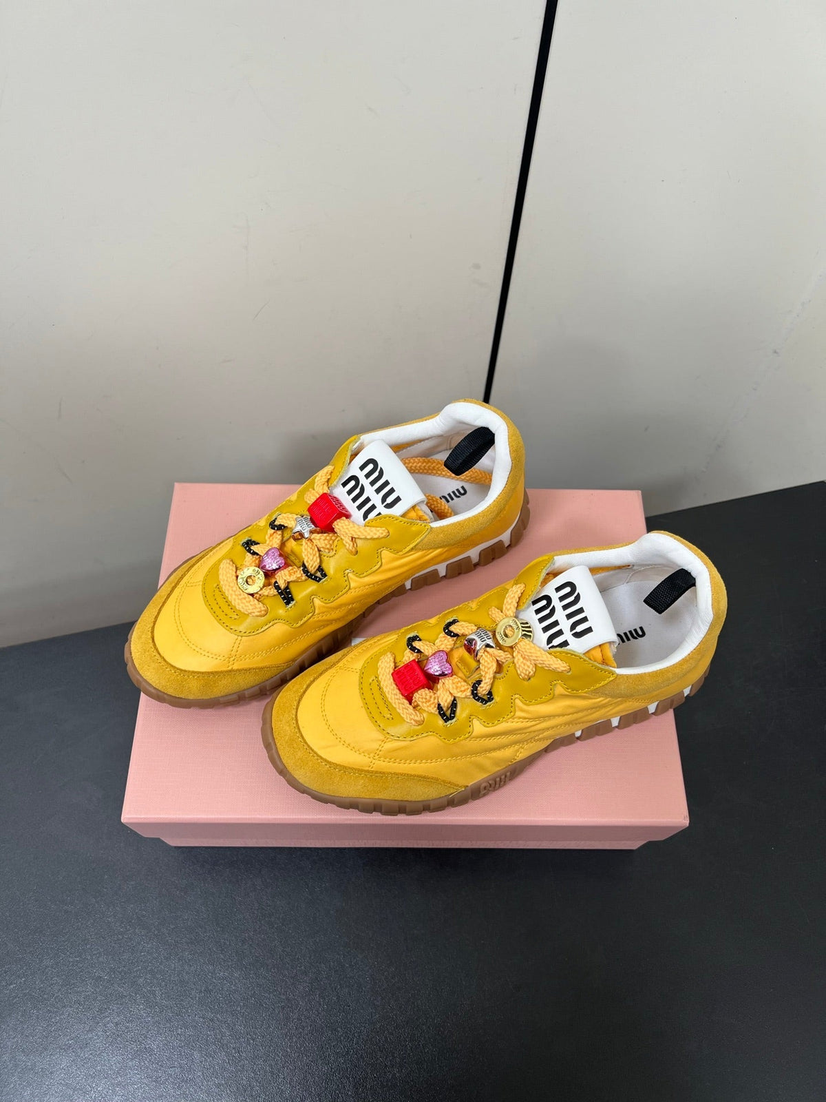 TYRE SNEAKERS IN YELLOW TECHNICAL FABRIC AND SUEDE WITH STICKER