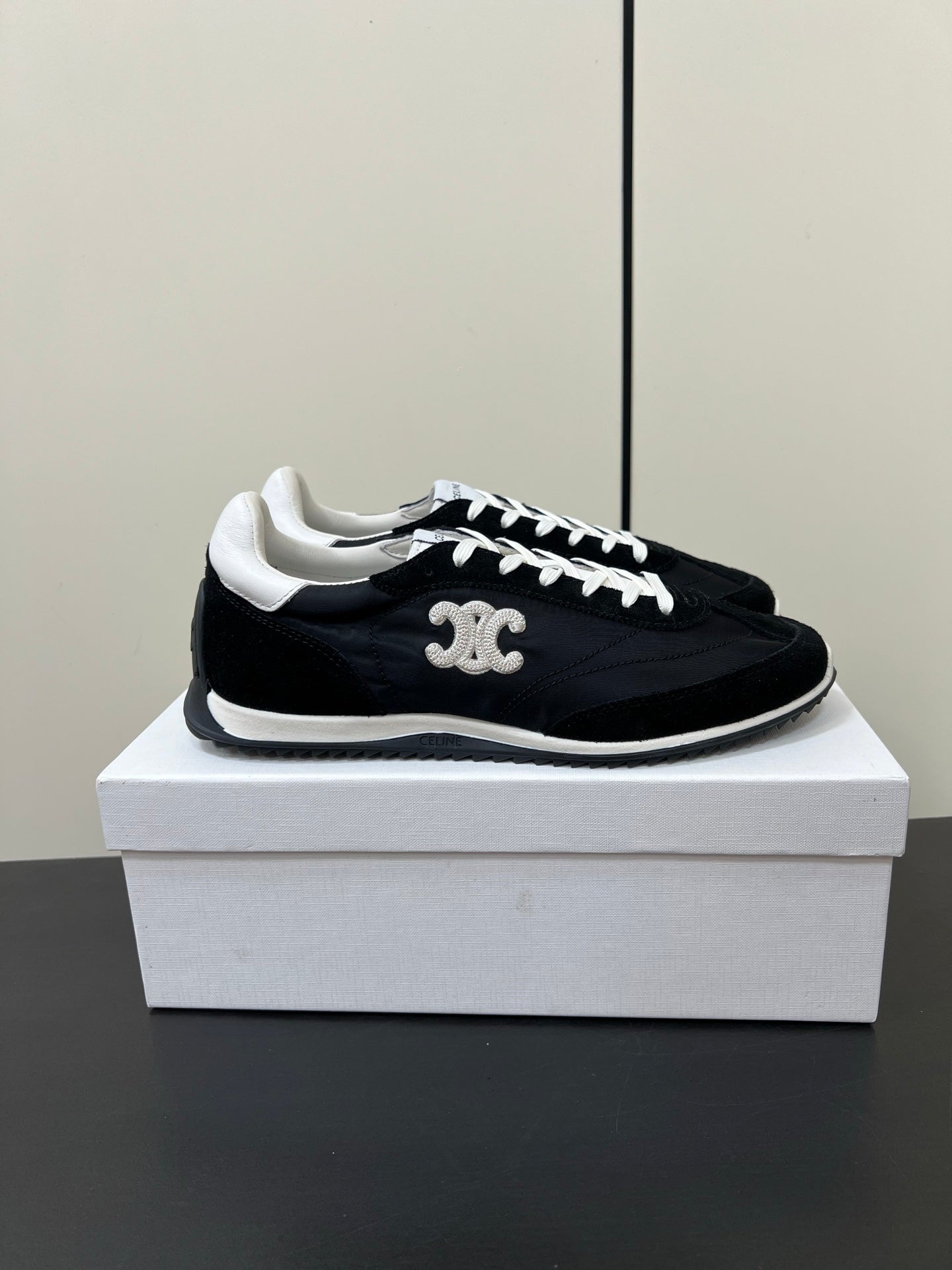 CELINE 25S RACER FORREST GUMP SNEAKERS IN BLACK MERCERIZED CALFSKIN