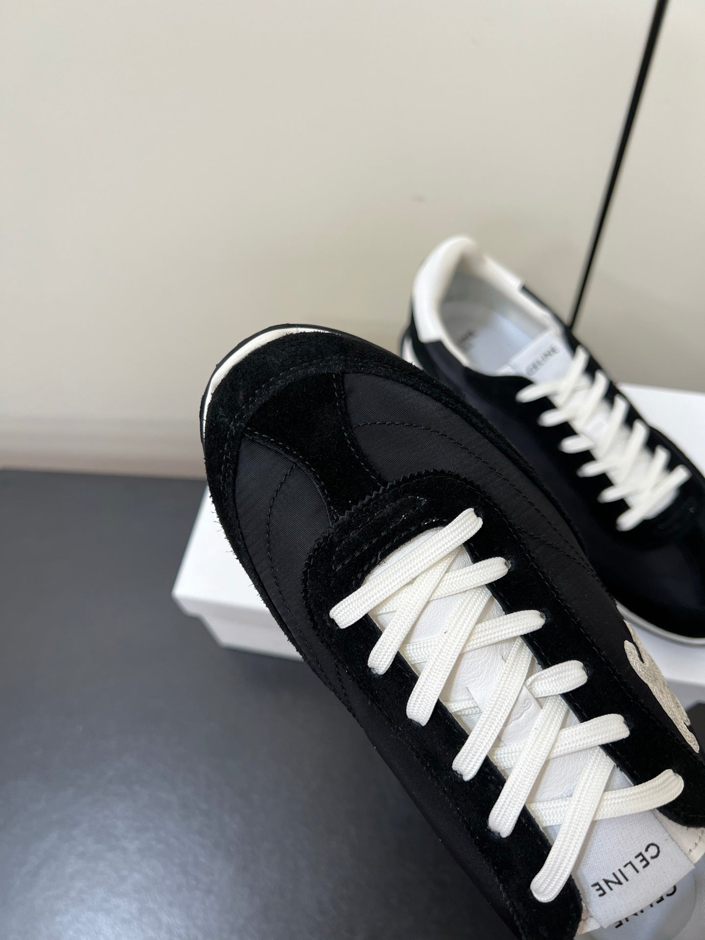 CELINE 25S RACER FORREST GUMP SNEAKERS IN BLACK MERCERIZED CALFSKIN