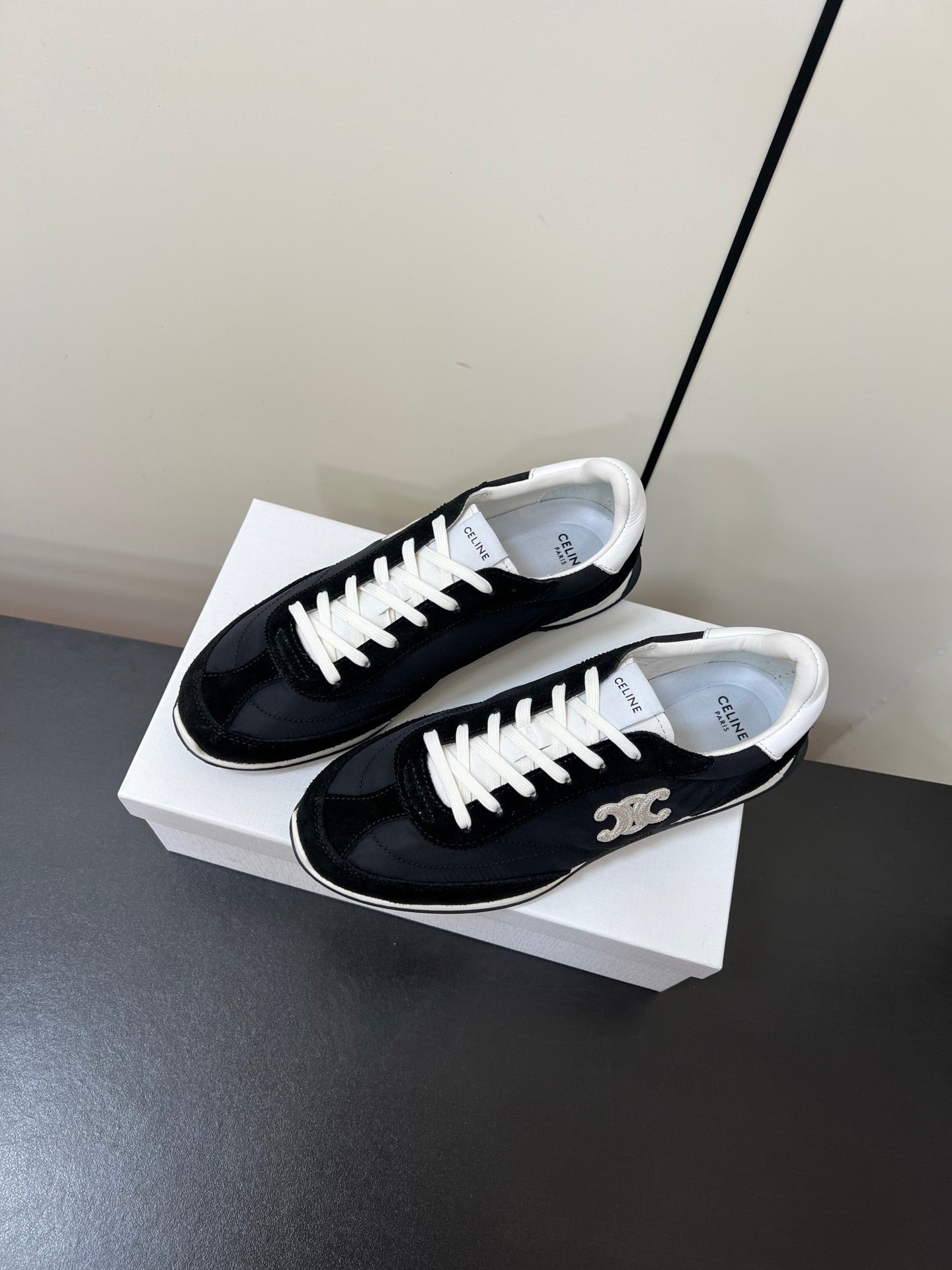 CELINE 25S RACER FORREST GUMP SNEAKERS IN BLACK MERCERIZED CALFSKIN