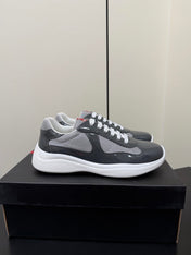 PRADA 26S SNEAKERS IN GRAY PATENT CALFSKIN AND WHITE MESH