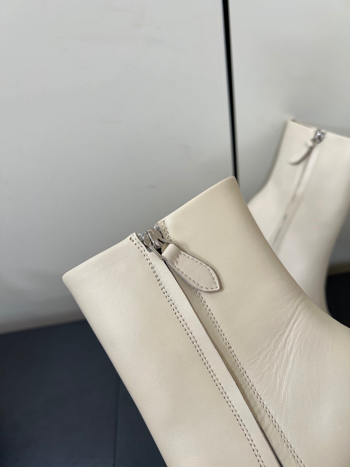 ALAIA 26S SQUARE-TOE BOOTS IN WHITE CALFSKIN