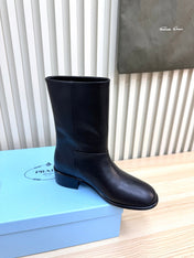 PRADA 25S LOW-CUT BOOTS IN BLACK LAMBSKIN