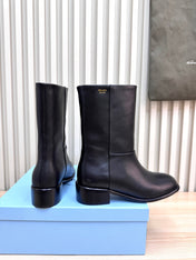 PRADA 25S LOW-CUT BOOTS IN BLACK LAMBSKIN