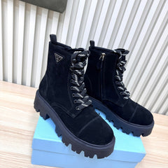 PRADA 25S MONOLITH BOOTS IN BLACK SUEDE