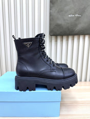 PRADA 25S MONOLITH BOOTS IN BLACK CALFSKIN