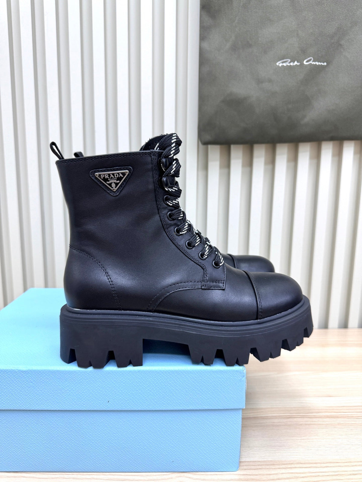 PRADA 25S MONOLITH BOOTS IN BLACK CALFSKIN