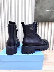 PRADA 25S MONOLITH BOOTS IN BLACK CALFSKIN