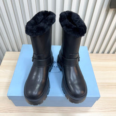 PRADA 25S MARTIN BOOTS IN BLACK CALFSKIN FUR-LINED