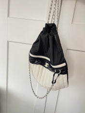 CHANEL 26S DRAWSTRING BACKPACK 44 IN BLACK AND WHITE NYLON GOLD HARDWARE