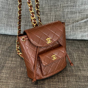 CHANEL 26S BACKPACK WITH FRONT POCKET 21 IN BROWN QUILTED LAMBSKIN GOLD HARDWARE