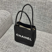 CHANEL 26S LOGO SHOPPING TOTE BAG 25 IN BLACK AND WHITE CALFSKIN GOLD HARDWARE