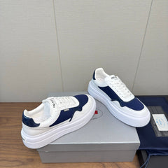 PRADA 25S DOWNTOWN BOLD SNEAKERS 45MM IN WHITE AND NAVY BLUE CALFSKIN