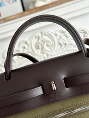 ZIP CABINE 31 BAG IN OLIVE GREEN CANVAS AND BLACK CALFSKIN