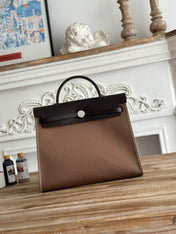 ZIP CABINE 31 BAG IN CHOCOLATE BROWN CANVAS AND BLACK CALFSKIN