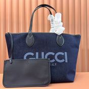 LARGE TOTISSIMA REVERSIBLE TOTE 30.5 IN DARK BLUE DENIM ONE SIDE BEIGE AND BLUE CALFSKIN ON THE OTHER