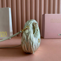 WANDER MATELASSÉ NAPPA MINI BAG 18 IN GOLDEN LAMBSKIN