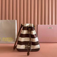 MIUMIU 26S BUCKET BAG 23 IN CREAM AND BROWN CANVAS GOLD HARDWARE