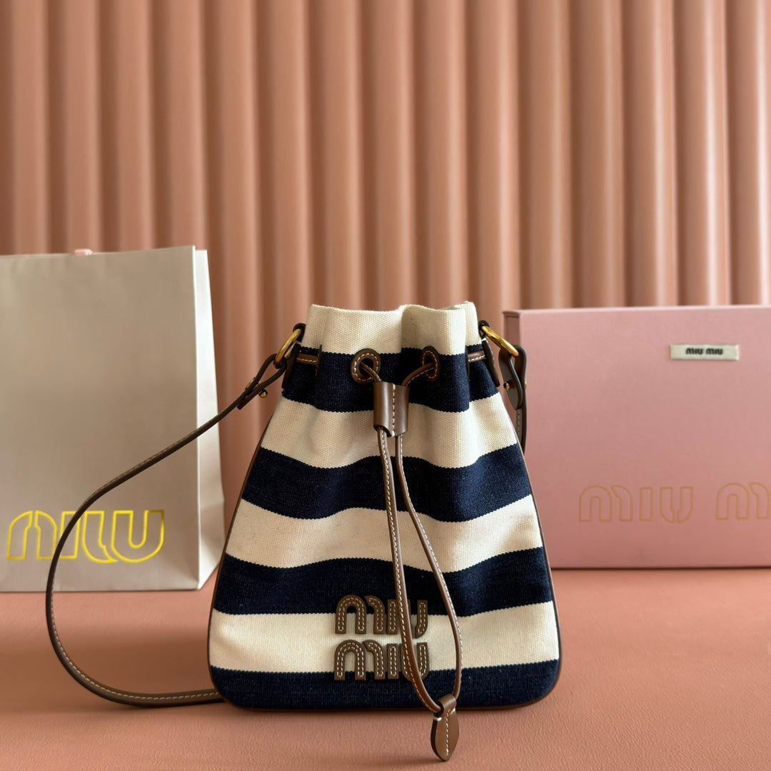 MIUMIU 26S BUCKET BAG 23 IN CREAM AND NAVY BLUE CANVAS GOLD HARDWARE